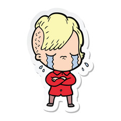 sticker of a cartoon crying girl with crossed arms