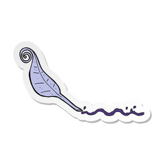 sticker of a cartoon feather quill