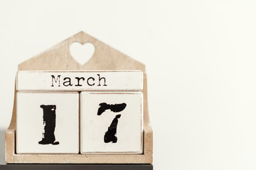 March 17 on a calendar on a desk and copy space. Holiday concept