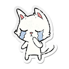 distressed sticker of a crying cartoon cat
