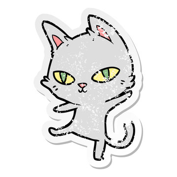 distressed sticker of a cartoon cat staring