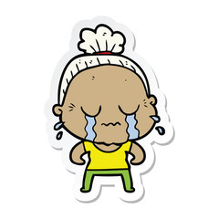 Obraz na płótnie Canvas sticker of a cartoon crying old lady