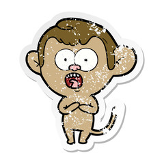 distressed sticker of a cartoon shocked monkey