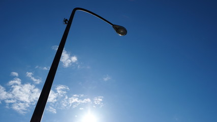 street lamp on background of blue sky