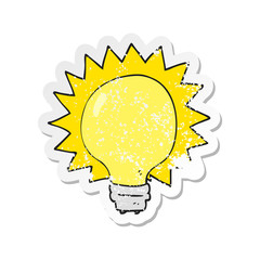retro distressed sticker of a cartoon light bulb