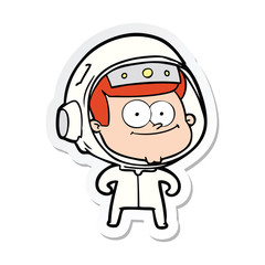 Obraz premium sticker of a happy astronaut cartoon