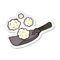 sticker of a cartoon coal shovel