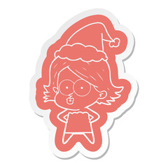 cartoon  sticker of a girl pouting wearing santa hat