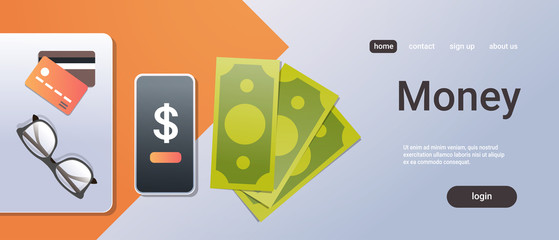 online mobile app money concept top angle view desktop smartphone credit card paper banknote office stuff horizontal copy space