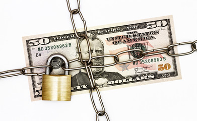 US dollar with padlock and chain