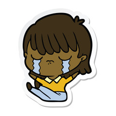 sticker of a cartoon woman crying