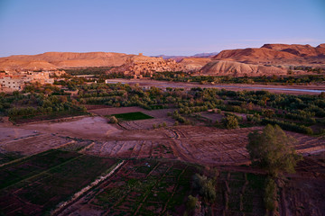 Valley under Ait Ben Haddou with fields in the foreground in Morocco Africa