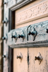 door decorated with metal bolts