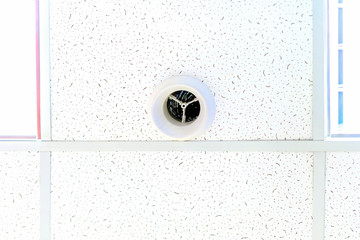 Ceiling ventilation, white on the background of the ceiling panels in the hole. Template for designers on the topic of construction.