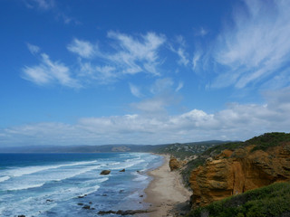 Fototapeta na wymiar A beach landscape with bright blue sky and clouds along the gold coast of Southern Australia
