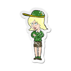 retro distressed sticker of a cartoon woman in uniform