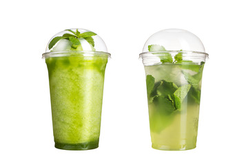 Delicious fruit smoothies in plastic cups, on a white background. Two cocktails with a taste of kiwi and mojito.