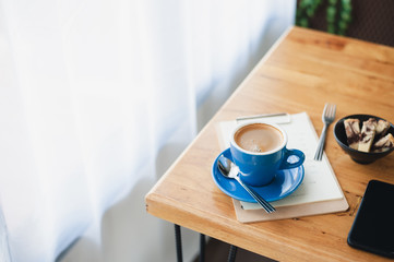 Hot coffee on table with abstract emotion
