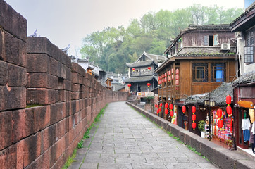 Fototapeta na wymiar The pathway of North Gate Wall (Gucheng Qiangcheng) toward to North Gate Tower in Fenghuang old city (Phoenix Ancient Town), Hunan Province, China.