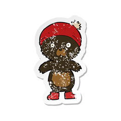 retro distressed sticker of a cartoon cute teddy bear