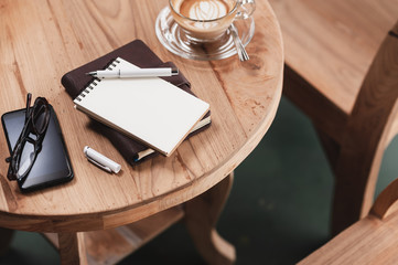 Coffee cup on rustic wood table