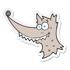 sticker of a cartoon wolf head