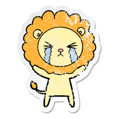 distressed sticker of a cartoon crying lion