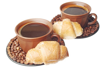 Cup with coffee, coffee beans and croissants on a white background