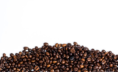 Roasted coffee beanon white