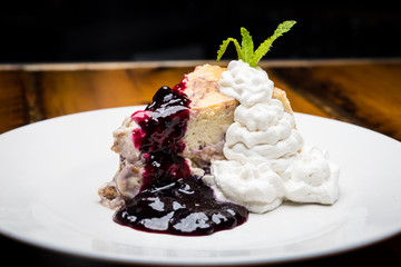 Cheesecake Topped with Whipped Cream and Fruit