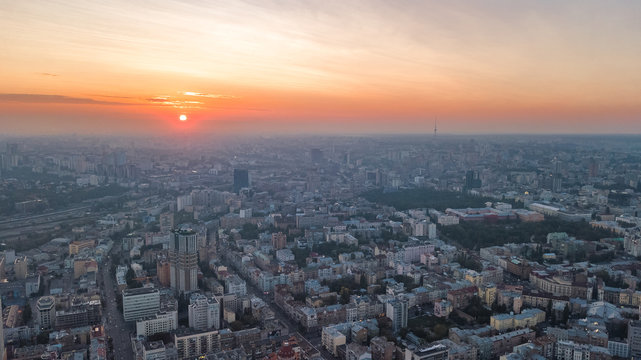 Aerial top view of Kiev city skyline on sunset from above, Kyiv center downtown cityscape in evening, capital of Ukraine © Iuliia Sokolovska