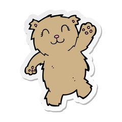 sticker of a cartoon waving teddy bear