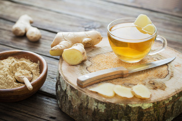 ginger tea on old wooden background