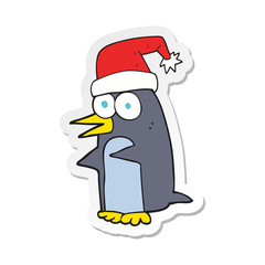 sticker of a cartoon christmas penguin