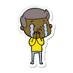 sticker of a cartoon man crying