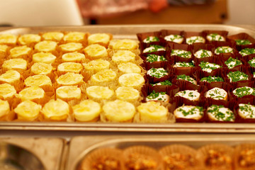 Cheese canape buffet meal in paper cups