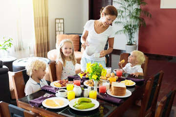 Obraz na płótnie Canvas Healthy family breakfast for mother and kids.