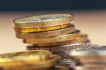 piles of coins on working table