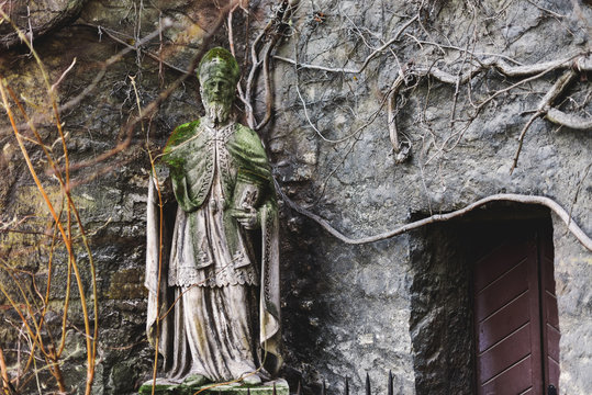 Vienna, Austria - December 30, 2017. Statue of Saint Rupert outside St. Ruprecht's Church - oldest in the Vienna. Medieval saint sculpture built in 8th century.