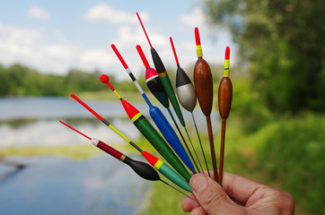 Fishing floats on the background of the river © yrafoto