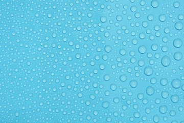 drops water on blue background