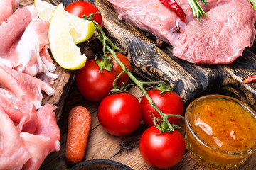 Raw beef meat with vegetables