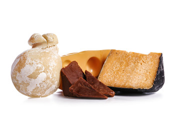 Assortment of tasty cheese on white background