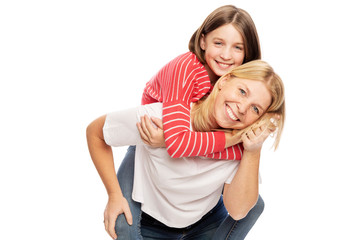 Fototapeta na wymiar Mum with a teenager daughter laughing and hugging, isolated on white background. Tenderness and love.