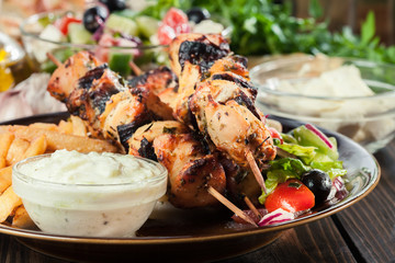 Chicken Souvlaki with french fries and tzatziki sauce