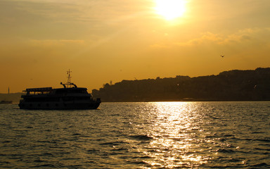 Sunset view of Istanbul and Bosphorus, city silhouette