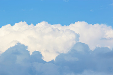 Texture of blue sky with white clouds and blue clouds.