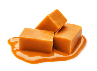 Tasty sweet caramel on white background