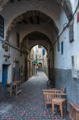 Narrow street and colorful old houses of medieval medina of Essaouira, Morocco