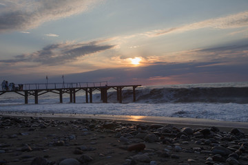 Exotic Paradise, sunset. Travel, Tourism and Vacations Concept. black sea Dock on the beach Batumi. The city embankment